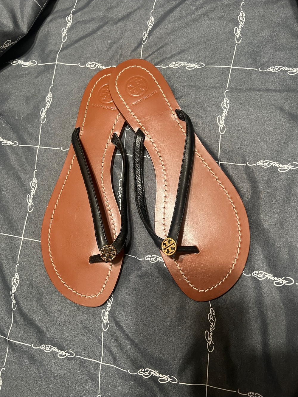 Tory Burch Black Leather Thong Sandals with Tan Footbed and Gold Logo